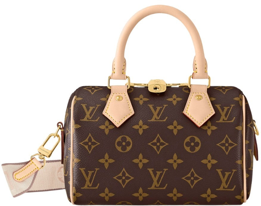 Designer handbag with monogram pattern on a white background